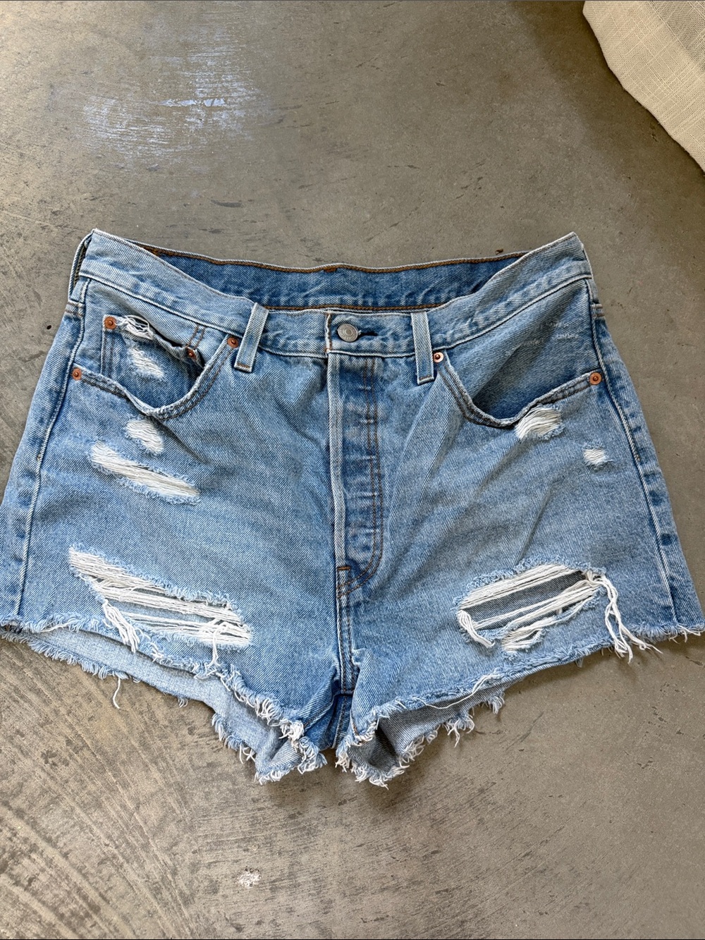 Levi's 501’s Light Blue Ripped Denim Shorts for Women